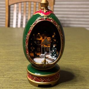 Charming Green, Red & Gold Musical Holiday Decor. Plays “Walking in a winter …”